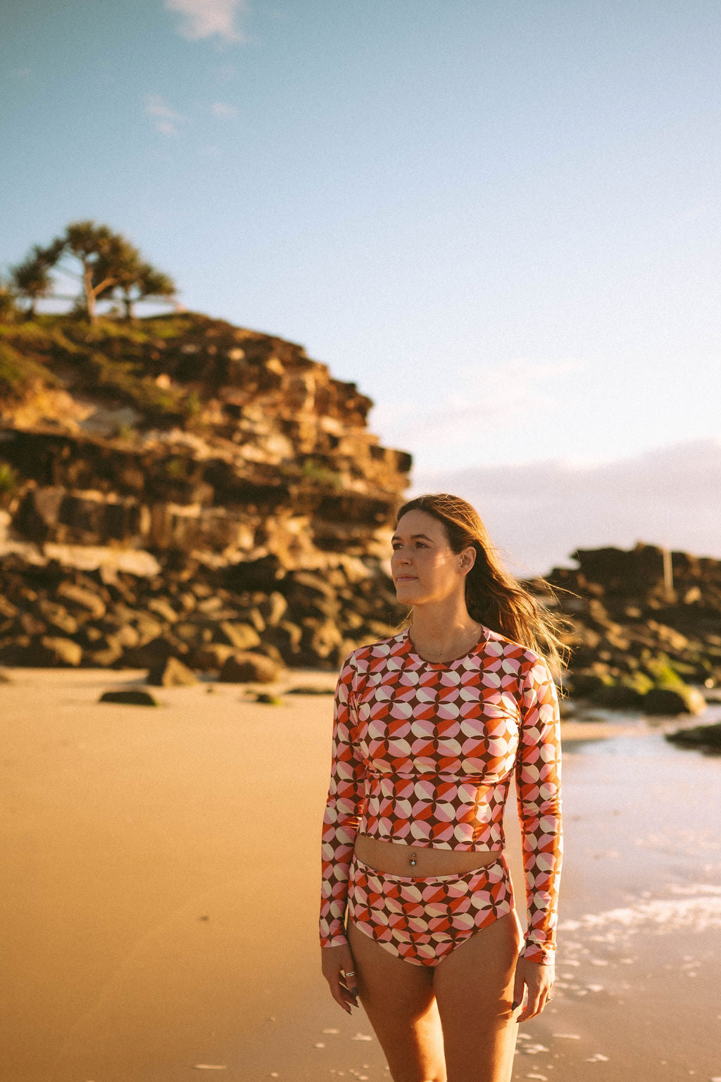Women's long sleeve rashie in Sunburst print, by Sunfolk Swimwear Australia