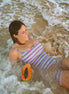 Women's swimming onesie and swim bodysuit in Electric Dusk print, by Sunfolk Swimwear Australia