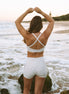 Women's high waisted surf shorts and triangle bikini top in Dune Daisy print, by Sunfolk Swimwear Australia
