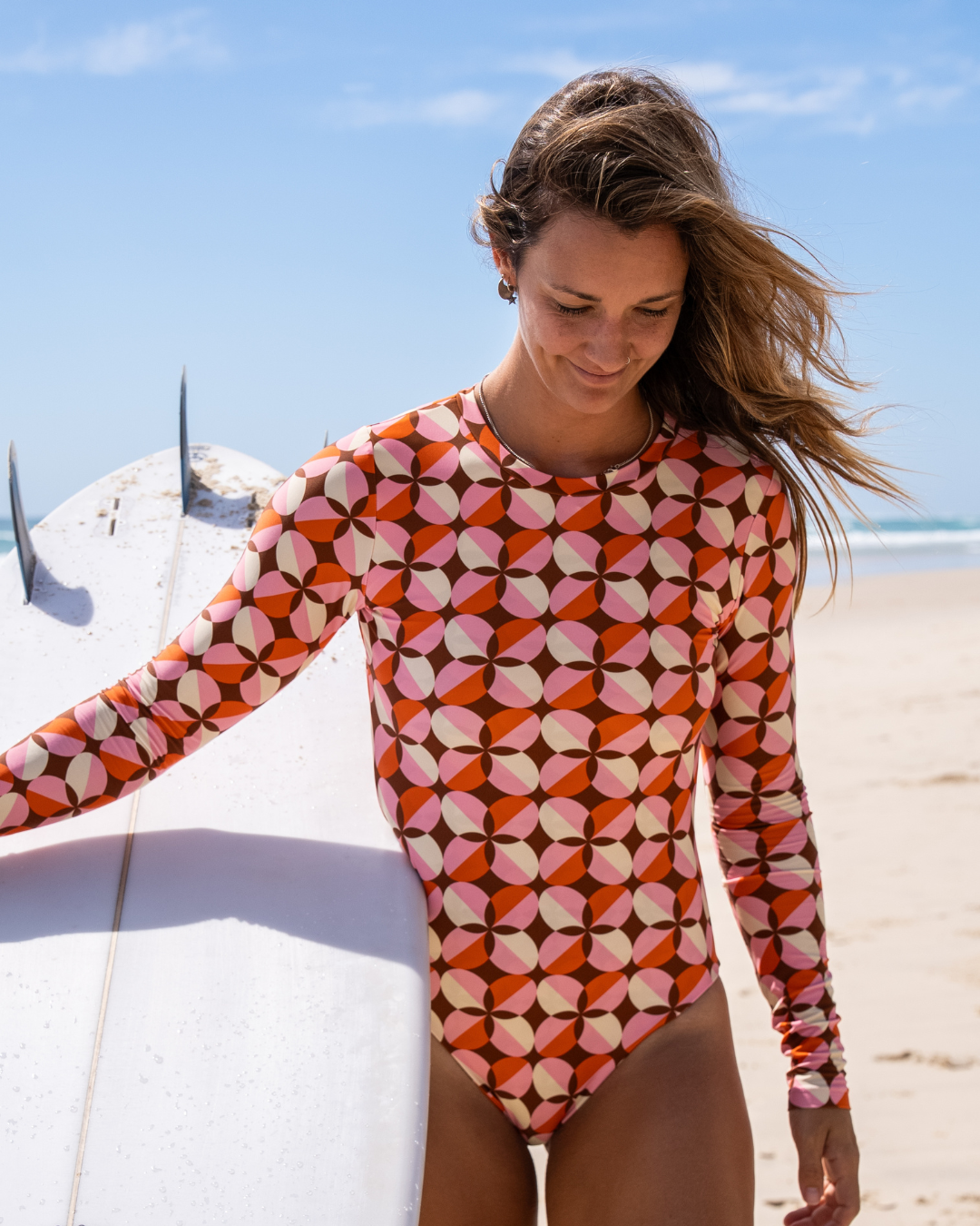 Women's long sleeve surf suit and swimsuit  in Wildflower print, by Sunfolk Swimwear Australia